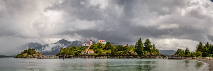Storm clouds over Nootka Island LIghthouse at Friendly Cove