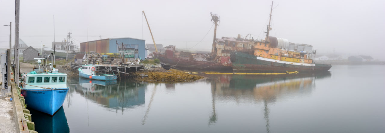 Derelict fishing vessels at marina in Nova Scotia
